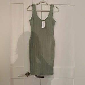Milk Money light green fitted dress, size L